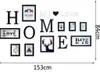 A wall decoration featuring letters, photo frames, and text spelling out 'HOME' and 'My Love'. Produktbild-Vorschau