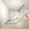 A top-down view of a modern shower enclosure in a bathroom corner. Produktbild-Vorschau