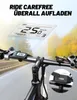 Close-up of an electric bicycle's handlebars and display, with a blurred road and autumn foliage in the background. Produktbild-Vorschau