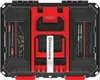 A top-down view of an open black and red tool case filled with various tools and accessories. Náhľad obrázku produktu