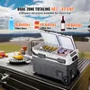 A portable dual-zone cooler is open and filled with drinks and food, set up outdoors with a scenic view in the background. Podgląd zdjęcia produktu