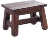 A small, dark brown wooden stool is shown against a white background. Produktbild-Vorschau