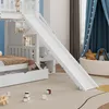 A child's bedroom with a white bunk bed, slide, and stairs. Produktbild-Vorschau