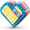 A heart-shaped LEGO box with colorful stripes and a yellow front panel. Anteprima dell’immagine prodotto