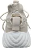 The back view of a beige and white sneaker. Produktbild-Vorschau