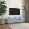 A modern living room with a TV stand and a large plant. Anteprima dell’immagine prodotto