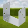 A metal U-shaped bracket is shown against a blurred background of green grass and a blue sky. Anteprima dell’immagine prodotto