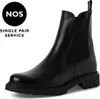 A black leather Chelsea boot is shown against a white background. Voir les images du produit