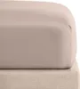 A close-up view of a fitted sheet on a mattress. Produktbild-Vorschau