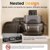 A multi-part air fryer is neatly arranged on shelves, showcasing its nested design and removable components. Produktbild-Vorschau