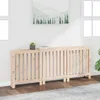 A wooden radiator cover is placed against a white wall with two windows. A small potted plant and a book are on top of the cover. Anteprima dell’immagine prodotto
