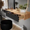 A close-up view of a modern vanity table with an open drawer. Anteprima dell’immagine prodotto