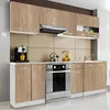 A modern kitchen with light wood cabinets, stainless steel appliances, and a beige tiled backsplash. Produktbild-Vorschau