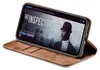 A brown flip case for an iPhone 11 is shown open, displaying the phone screen which shows a movie poster for 'The Inspector'. Produktbild-Vorschau