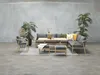 An outdoor furniture set arranged on a concrete floor against a concrete wall, with plants as decoration. Produktbild-Vorschau