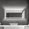 A modern bathroom vanity with a large LED mirror above a sink. Anteprima dell’immagine prodotto