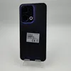 The back of a black smartphone is displayed on a clear stand against a white background. The phone has a prominent camera module with blue lighting around it. A sticker with product information and certification marks is attached to the back. Náhľad obrázku produktu