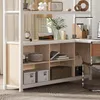 A home office or study area with a desk and shelving unit. Voir les images du produit