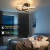 A child sleeping in a bedroom with a modern ceiling lamp. Produktbild-Vorschau