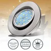 A close-up of an LED recessed light fixture with icons below indicating features. Voir les images du produit