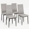 Four gray dining chairs with ribbed backs and black legs are arranged on a white background. Náhľad obrázku produktu
