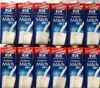 A stack of milk cartons. Anteprima dell’immagine prodotto