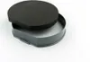 A black foam filter sits on top of a gray plastic housing, both against a white background. Produktbild-Vorschau