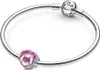 A close-up studio shot of a Pandora bracelet with a flower charm. Produktbild-Vorschau
