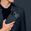 A person wearing a suit holds up a phone case. Náhľad obrázku produktu