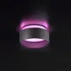 A modern ceiling light fixture with indirect pink lighting against a black background. Produktbild-Vorschau