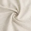 A close-up shot of a beige fabric with subtle gray stripes, folded and swirled. Produktbild-Vorschau