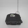 A black stereo radio with a CD player and cassette recorder is shown against a white background. Voir les images du produit