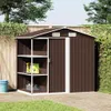 A brown metal garden shed with shelves is shown in an outdoor setting, on a paved patio with grass in the foreground. Náhled obrázku produktu