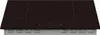 A black induction cooktop is shown from a front-facing, slightly elevated angle, set into a countertop. The cooktop has four heating zones marked by white lines and a digital display panel with red illuminated numbers and symbols. Produktbild-Vorschau