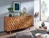 A living room scene featuring a wooden sideboard, coffee table, and chair. Anteprima dell’immagine prodotto