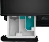 A close-up view of a washing machine detergent drawer, showing compartments for wash and softener. Produktbild-Vorschau