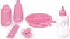 A collection of pink baby doll accessories, including bottles, a bowl with utensils, a pacifier, and toiletries, arranged on a white background. Produktbild-Vorschau