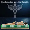 A person lying on a mattress with a graphic of a spine and a caduceus symbol above. Produktbild-Vorschau