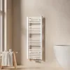 A white towel radiator is mounted on a light beige wall in a bathroom, next to a window and a bathtub. Náhled obrázku produktu