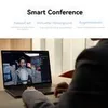 A person is using a laptop with a video conference call displayed on the screen. Produktbild-Vorschau