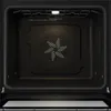 Interior view of an empty oven with a fan in the center. Produktbild-Vorschau