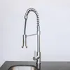 A stainless steel kitchen faucet with a pull-down sprayer is shown against a plain white background. Náhľad obrázku produktu