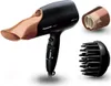 A black Panasonic hair dryer with copper accents and two attachments, a concentrator nozzle and a diffuser, are displayed against a white background. Podgląd zdjęcia produktu