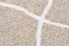 A close-up view of a woven rug with a geometric pattern. Náhľad obrázku produktu