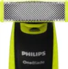Close-up of the top part of a Philips OneBlade electric shaver, showing the blade assembly and part of the handle. Podgląd zdjęcia produktu