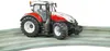 A toy tractor on a green track. Anteprima dell’immagine prodotto