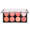 A makeup palette with eight circular pans of blush and highlighter, displayed in a black case with a clear lid. Produktbild-Vorschau