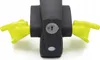 A close-up, studio shot of a black steering wheel lock with two bright yellow arms extended outwards, set against a plain white background. Voir les images du produit