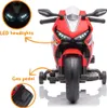 A red electric motorcycle with training wheels, featuring close-ups of its LED headlights and gas pedal. Náhľad obrázku produktu