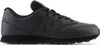 A side view of a black New Balance sneaker. Voir les images du produit